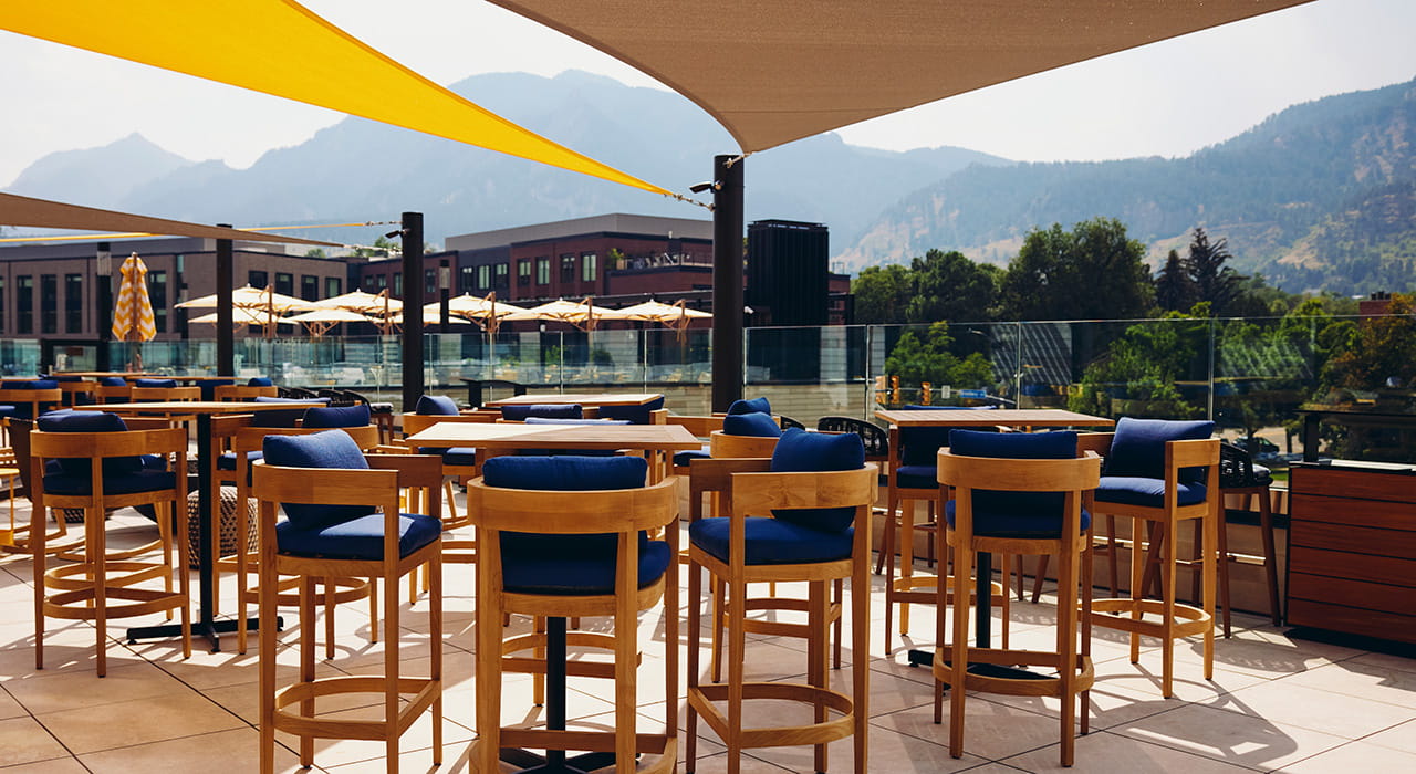 rooftop tables overlooking flatirons