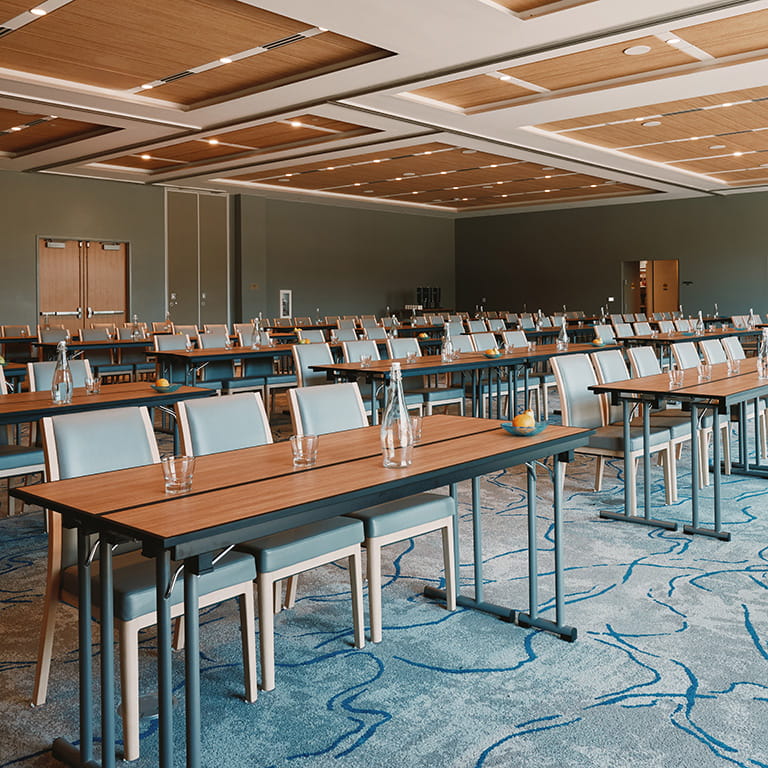 ballroom event space set up for large meeting