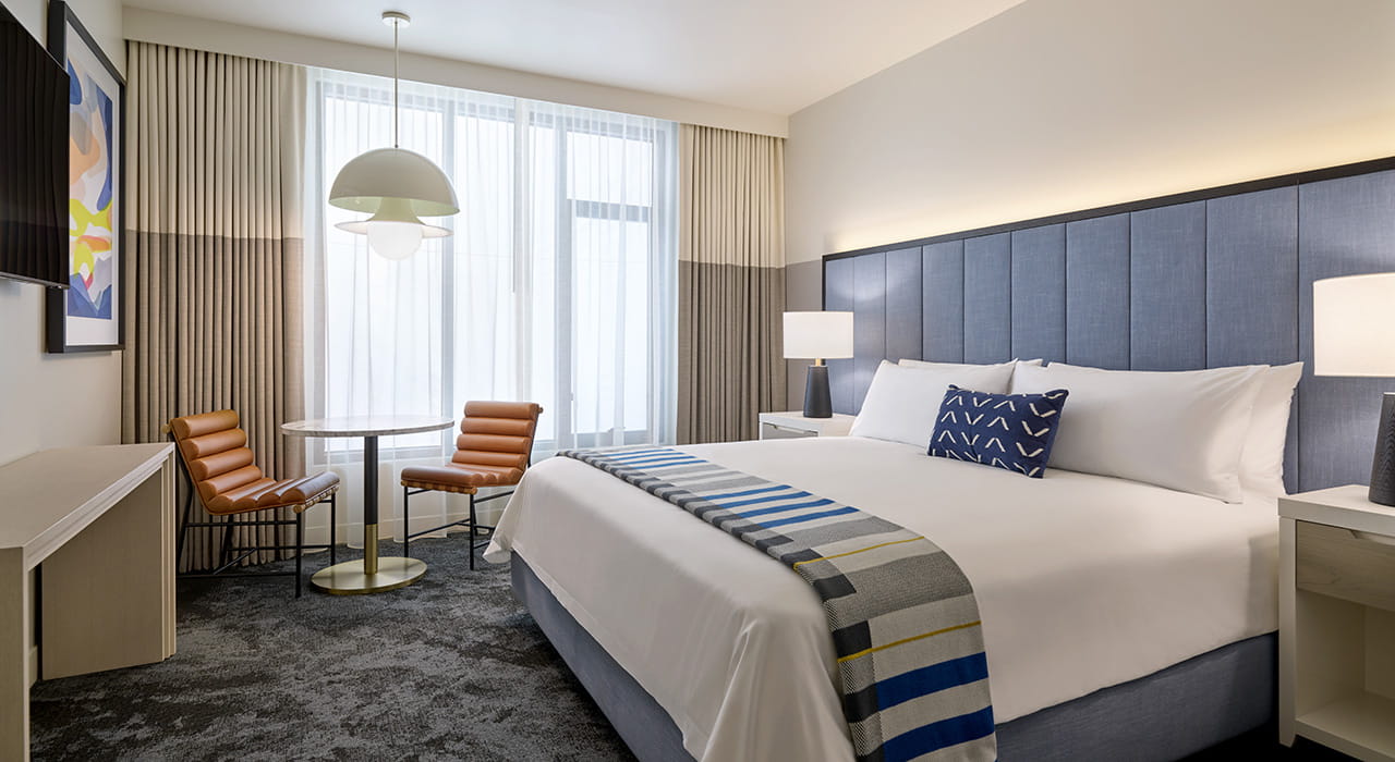 bed and table in guest room