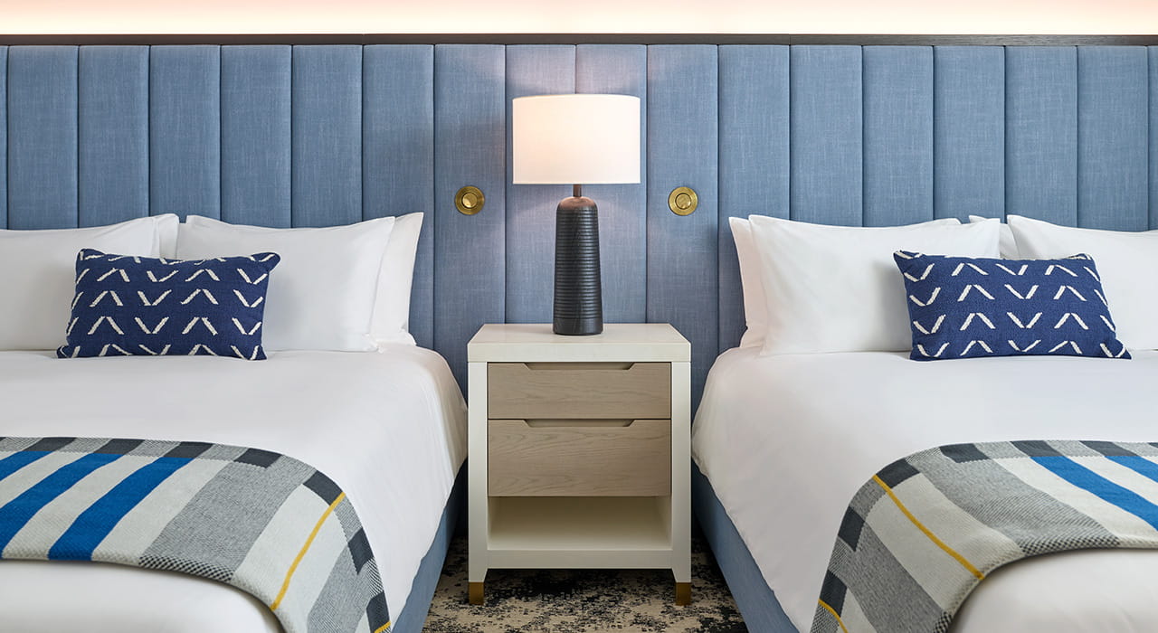 two queen beds in guest room