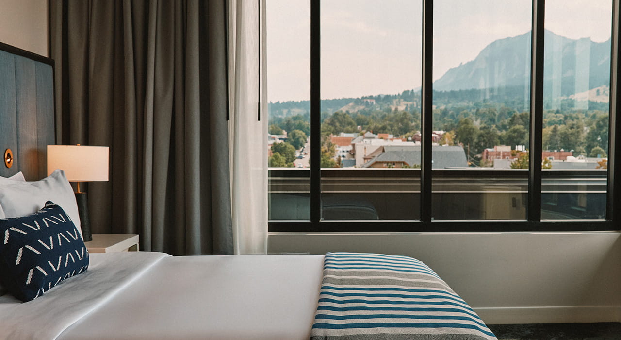 bed overlooking flatirons