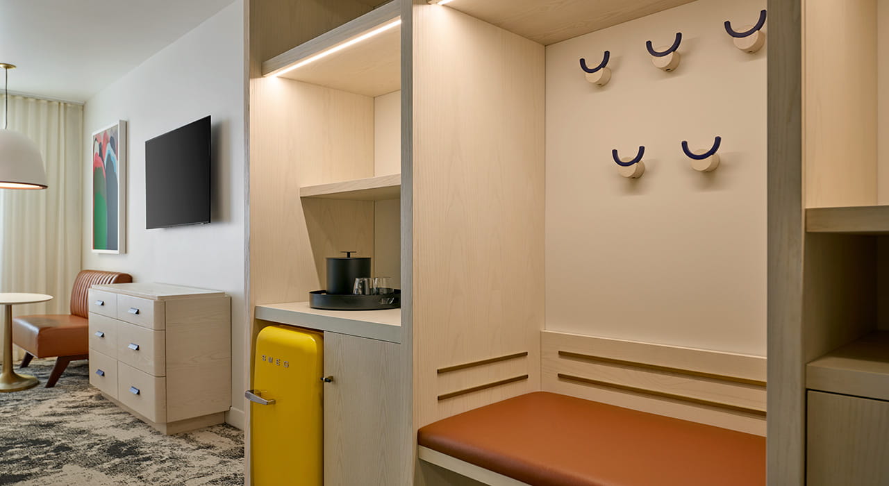 mini bar and storage area of guest room