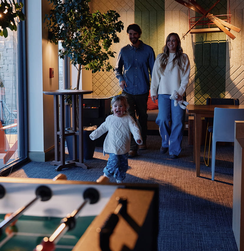 family in kids game room at limelight 