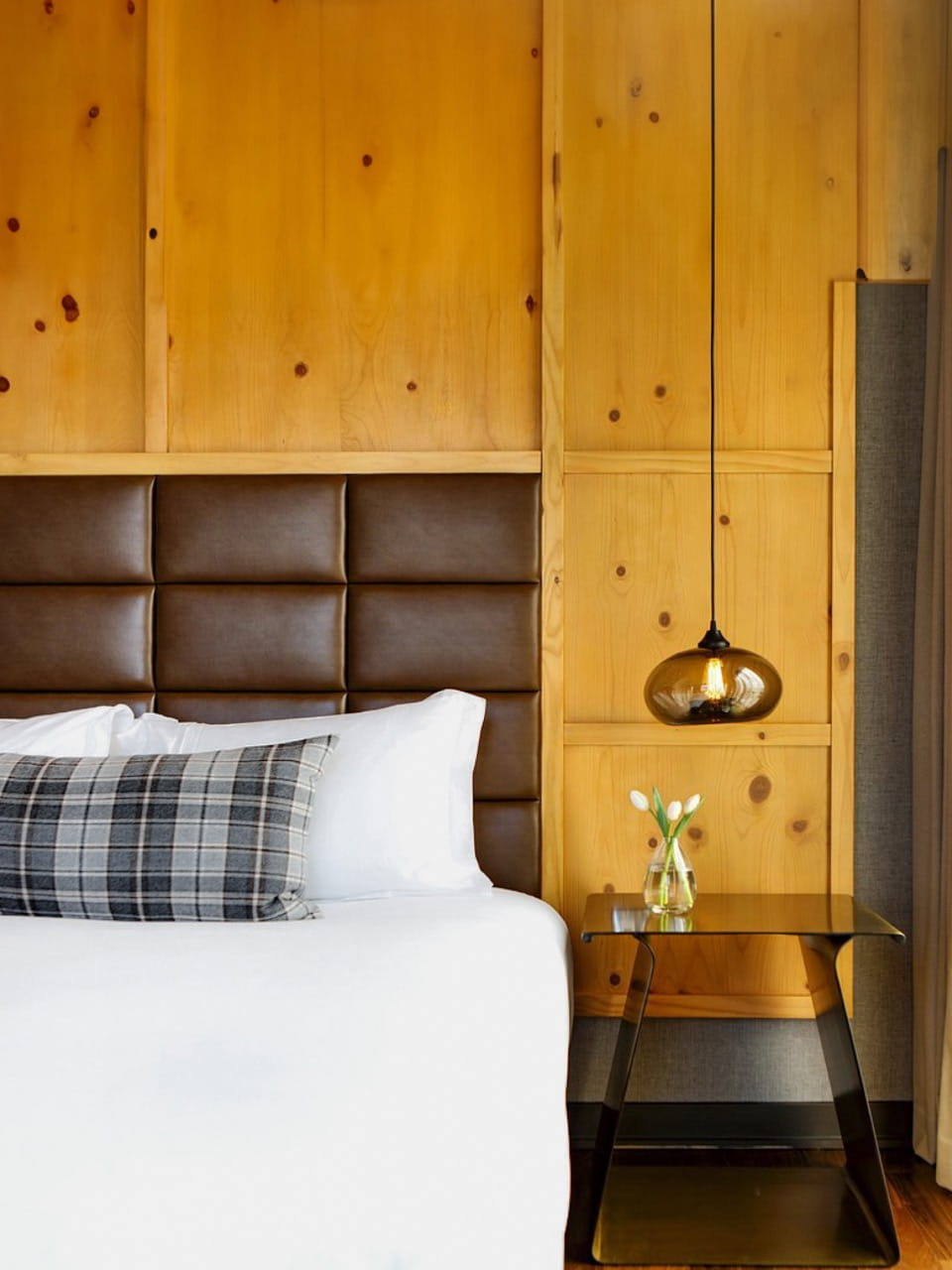 bed in guestroom at limelight denver