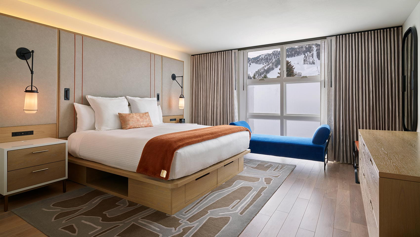 Bed in a suite at Limelight Aspen