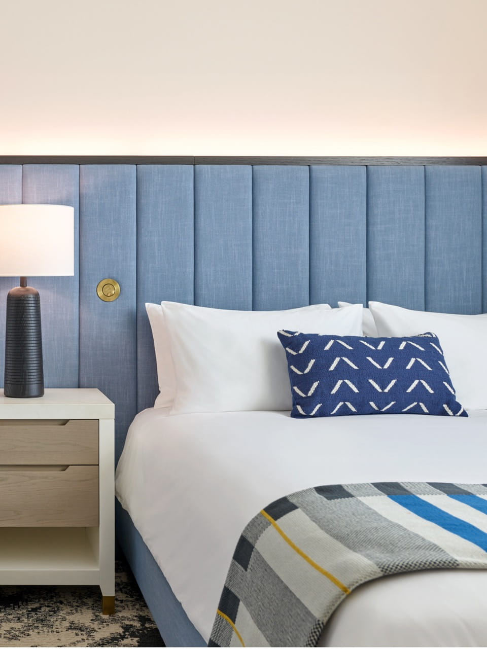 bed in guestroom at limelight boulder