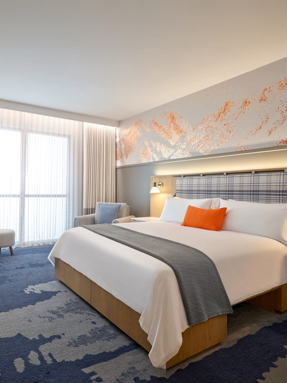 bed in guestroom at limelight mammoth