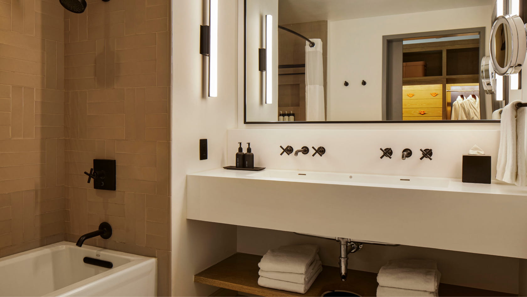 bathroom vanity and shower tub in guestroom