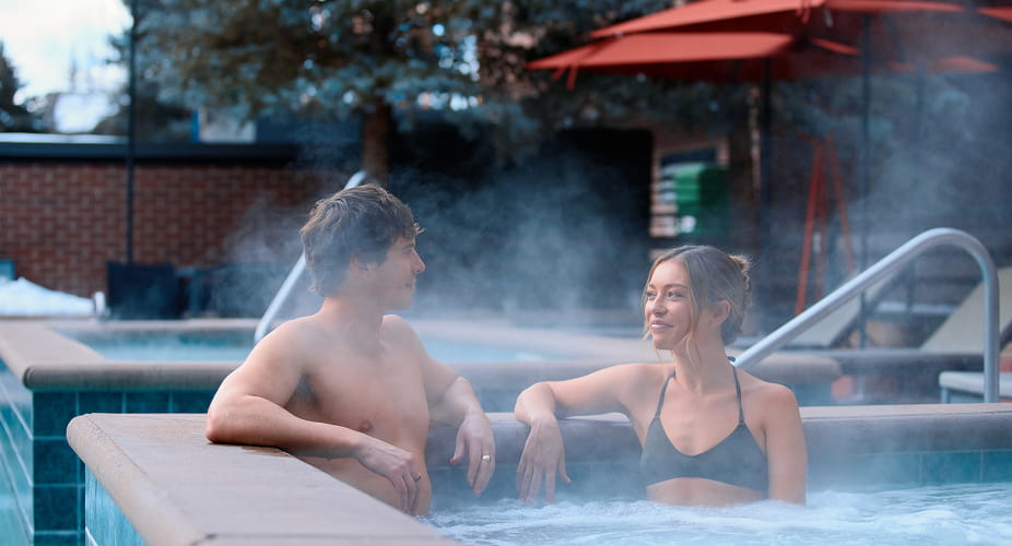 couple in limelight aspen hot tub