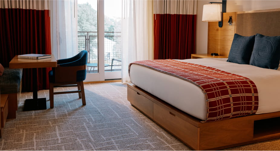 bed and table in guest room