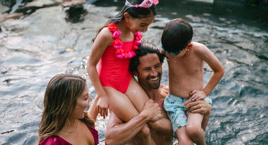 family in hot tub at limelight snowmass