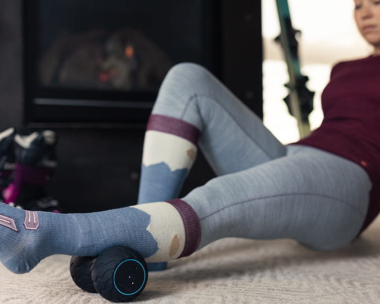 person using waveduo on calf