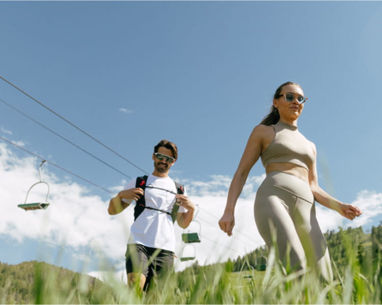 couple hiking on aspen mountain