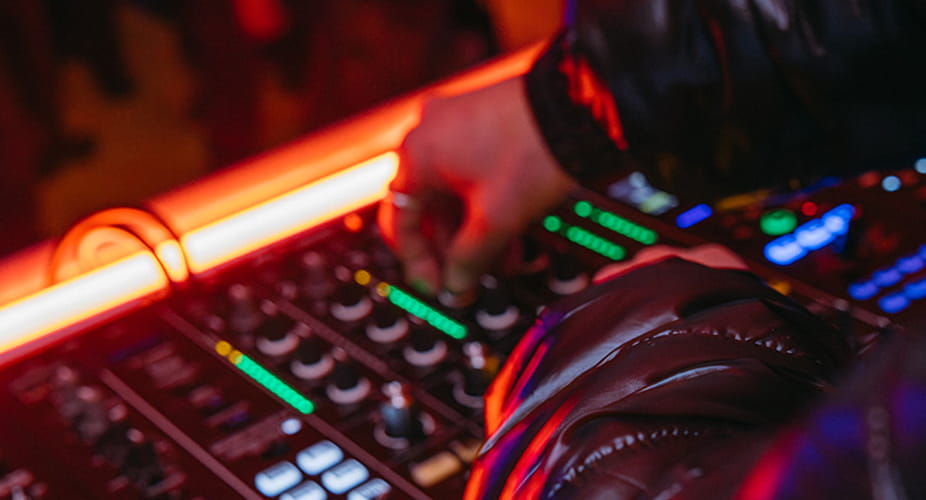 hand on dj mixing table