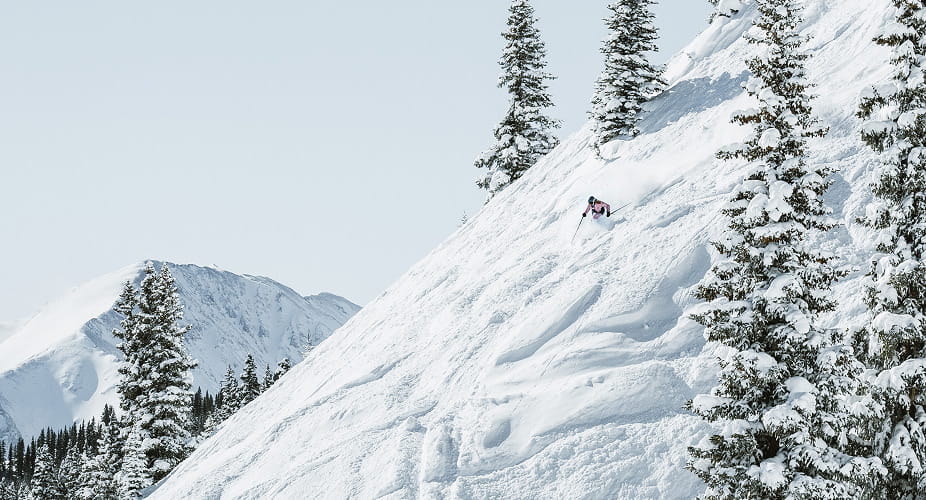 skier skiing down mountain