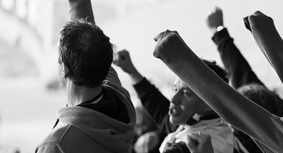 people cheering at event