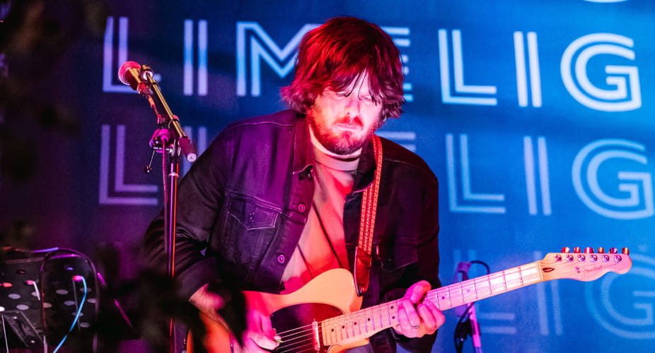 guitarist performing on stage