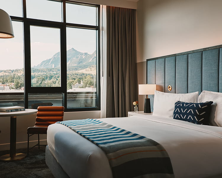 bed and table in guest room