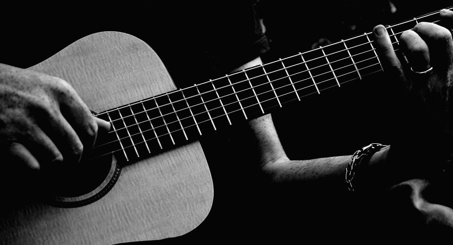 person playing guitar