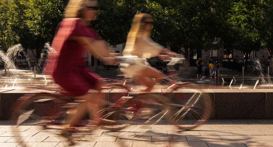 two women on bikes