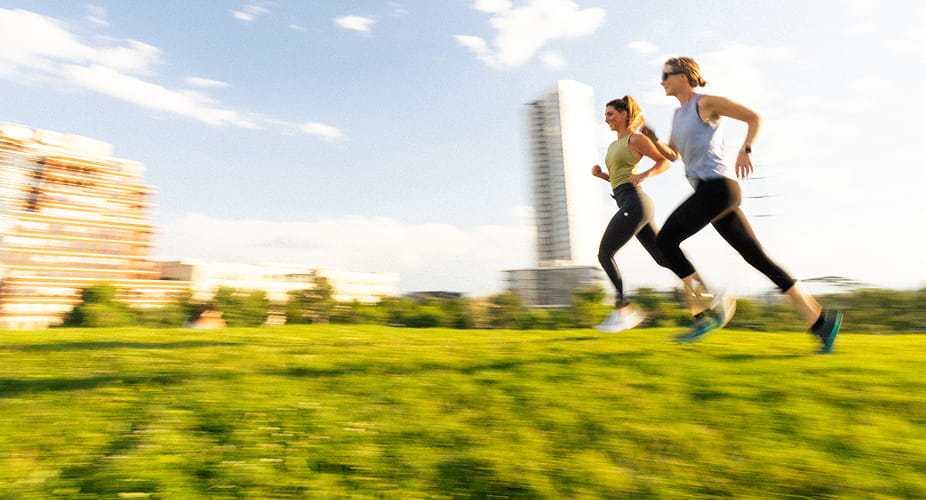 two women running in confluence park