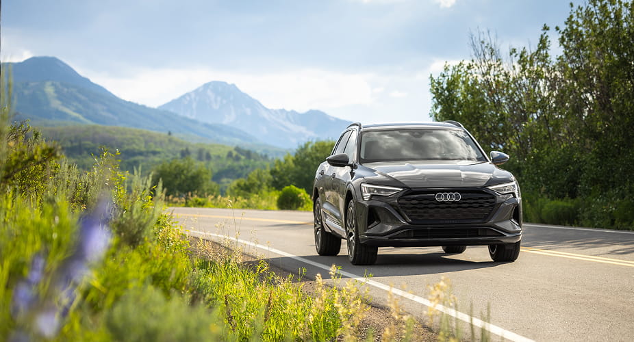 audi car driving in mountains