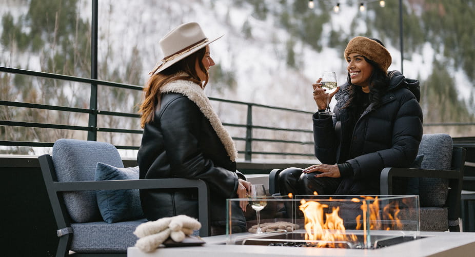 two woman on limelight aspen hotel rooftop