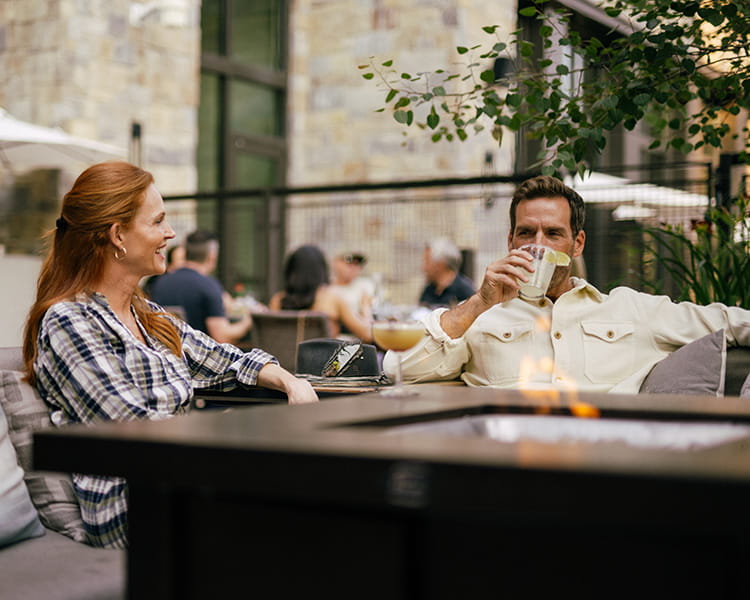 couple hanging out at outdoor plaza