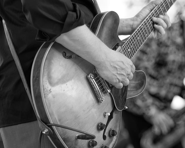 man playing guitar