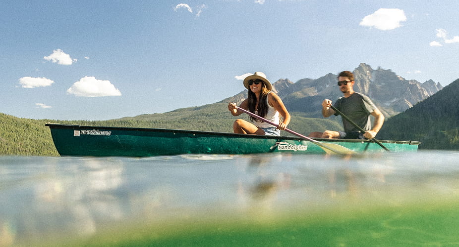 couple canoeing in redfish lake