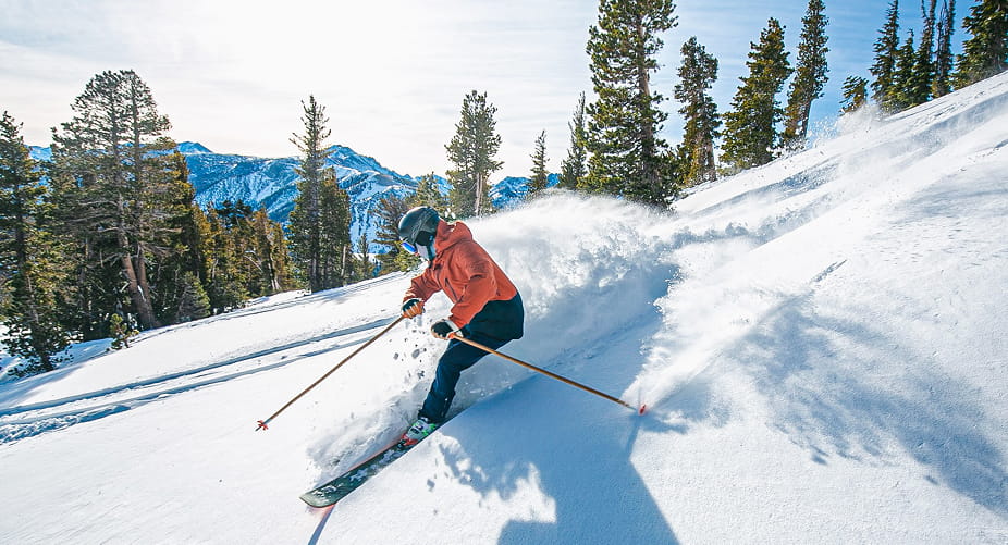 person skiing down mountain