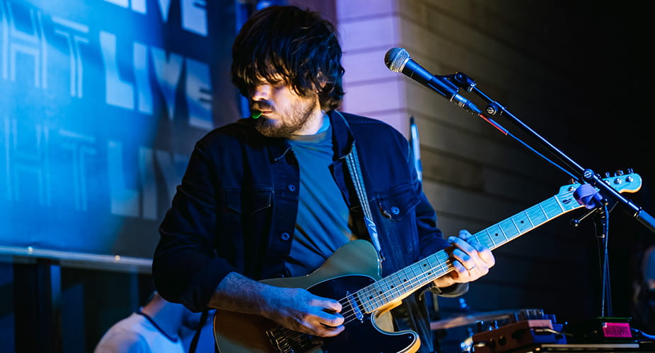 guitarist performing on stage