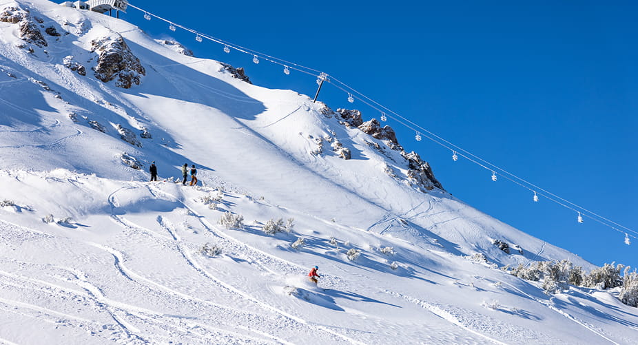 person skiing down mammoth mountain