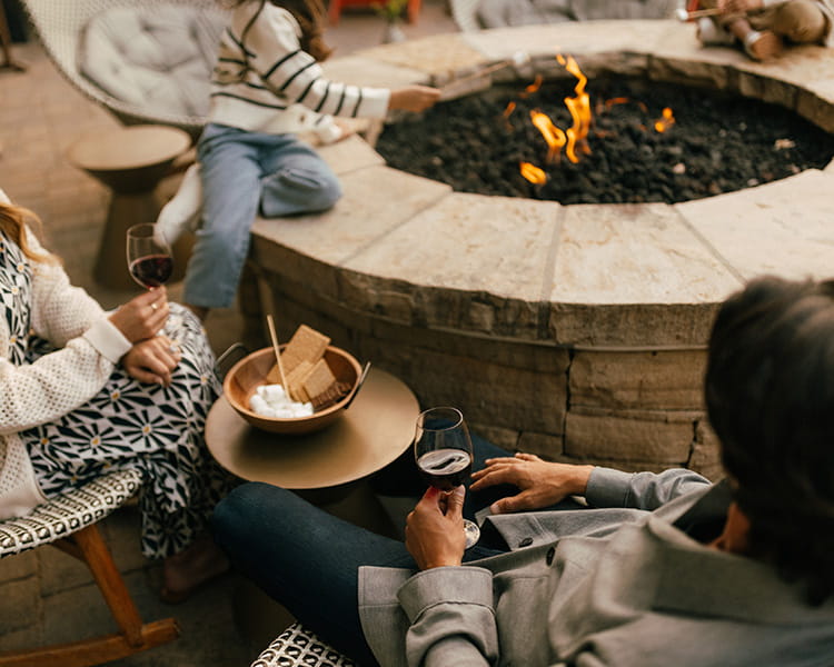 family by firepits at limelight snowmass