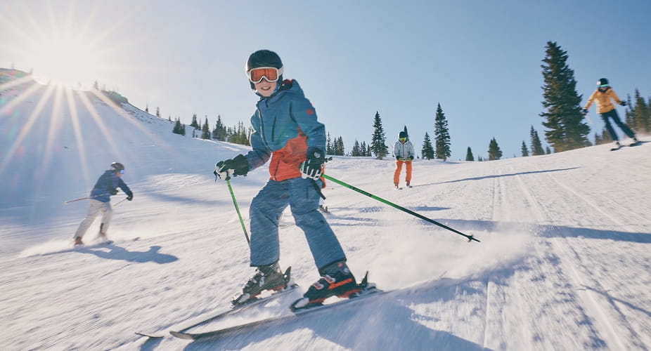 kid skiing on snowmass mountain