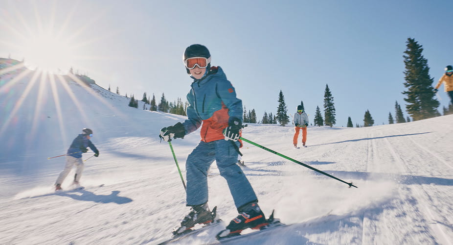 kid skiing on snowmass mountain