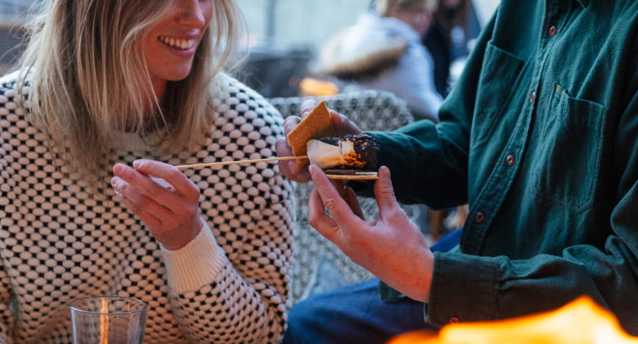 couple roasting marshmellows