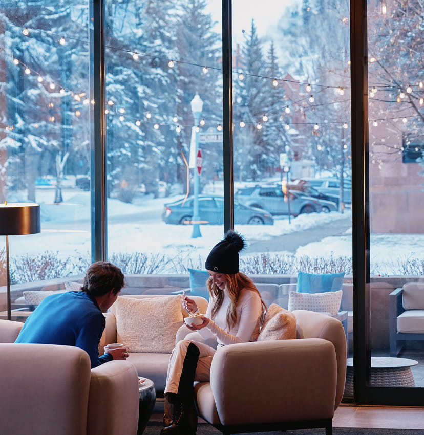 couple sitting in hotel lounge