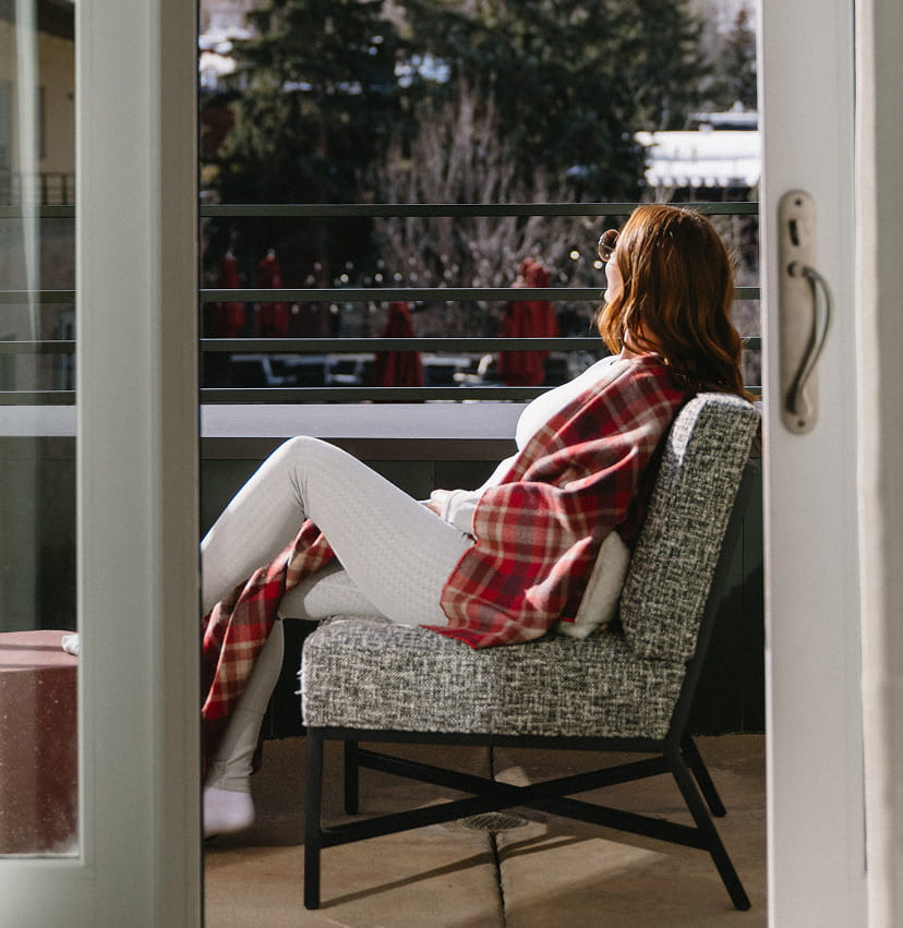 woman on hotel room balcony
