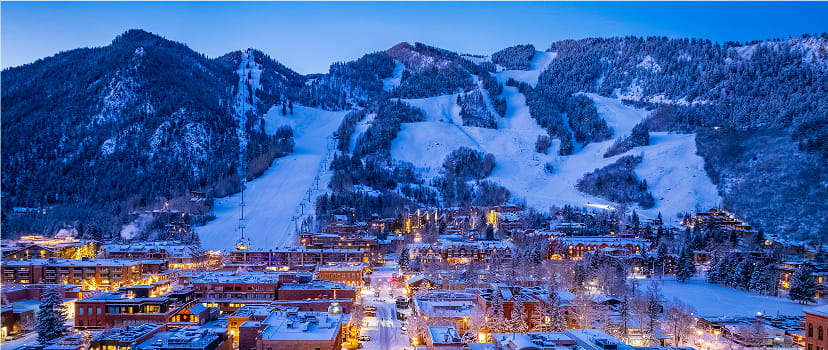 aerial of aspen town at night in winter