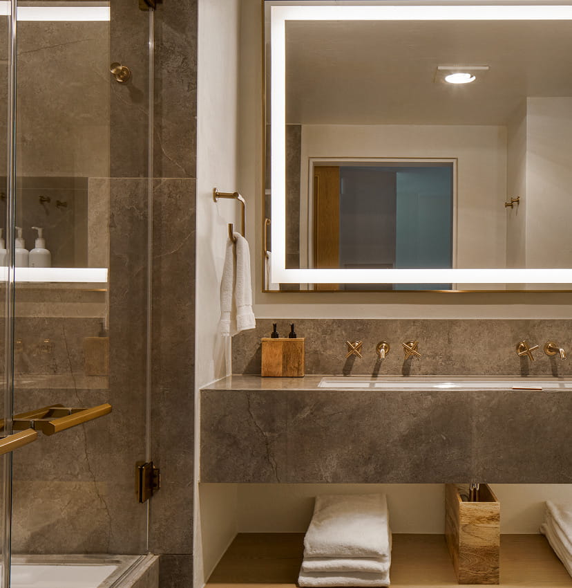 shower and vanity in guestroom