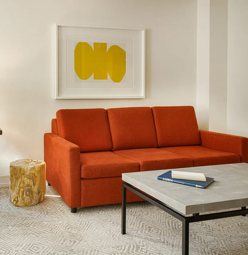 red couch in guest room