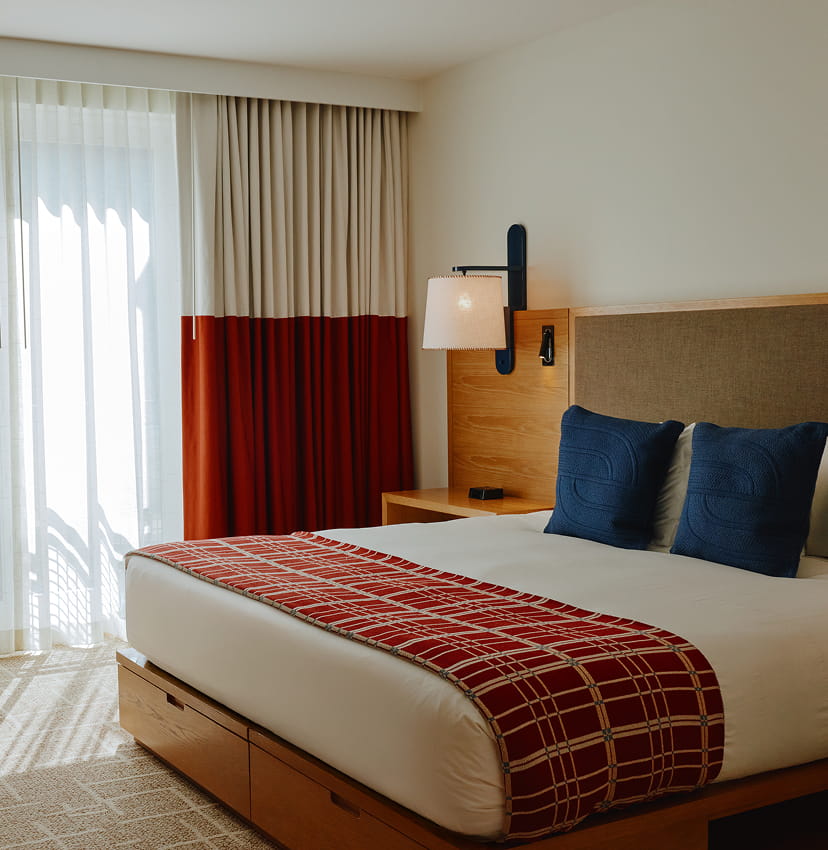 bed in guestroom at limelight ketchum