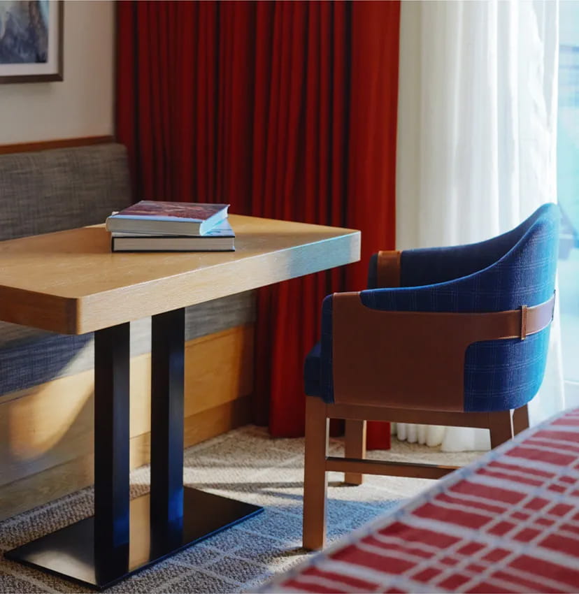 chair and table in guest room
