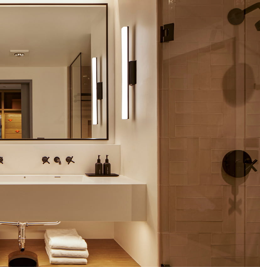 shower and vanity in guestroom