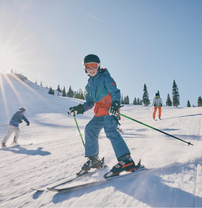 kid skiing on snowmass mountain