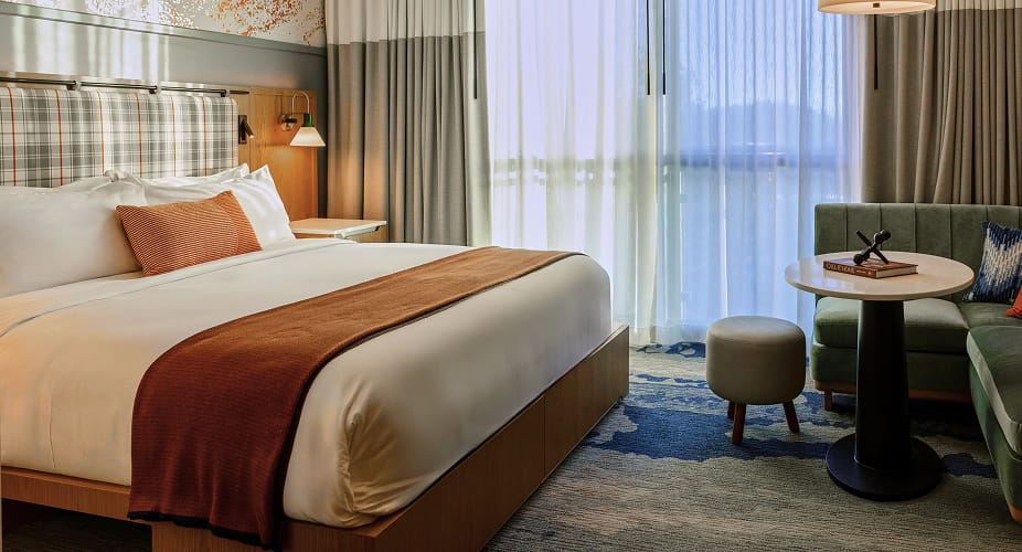 bed in guestroom at limelight mammoth