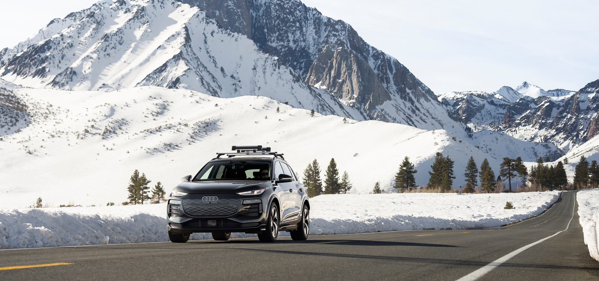 audi in mountains in winter