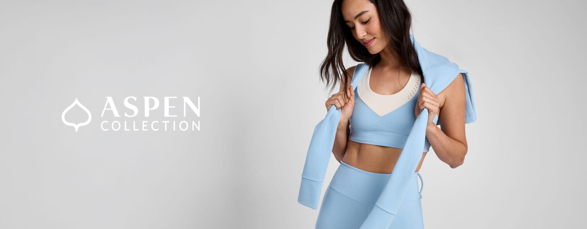 woman with Aspen collection clothing on