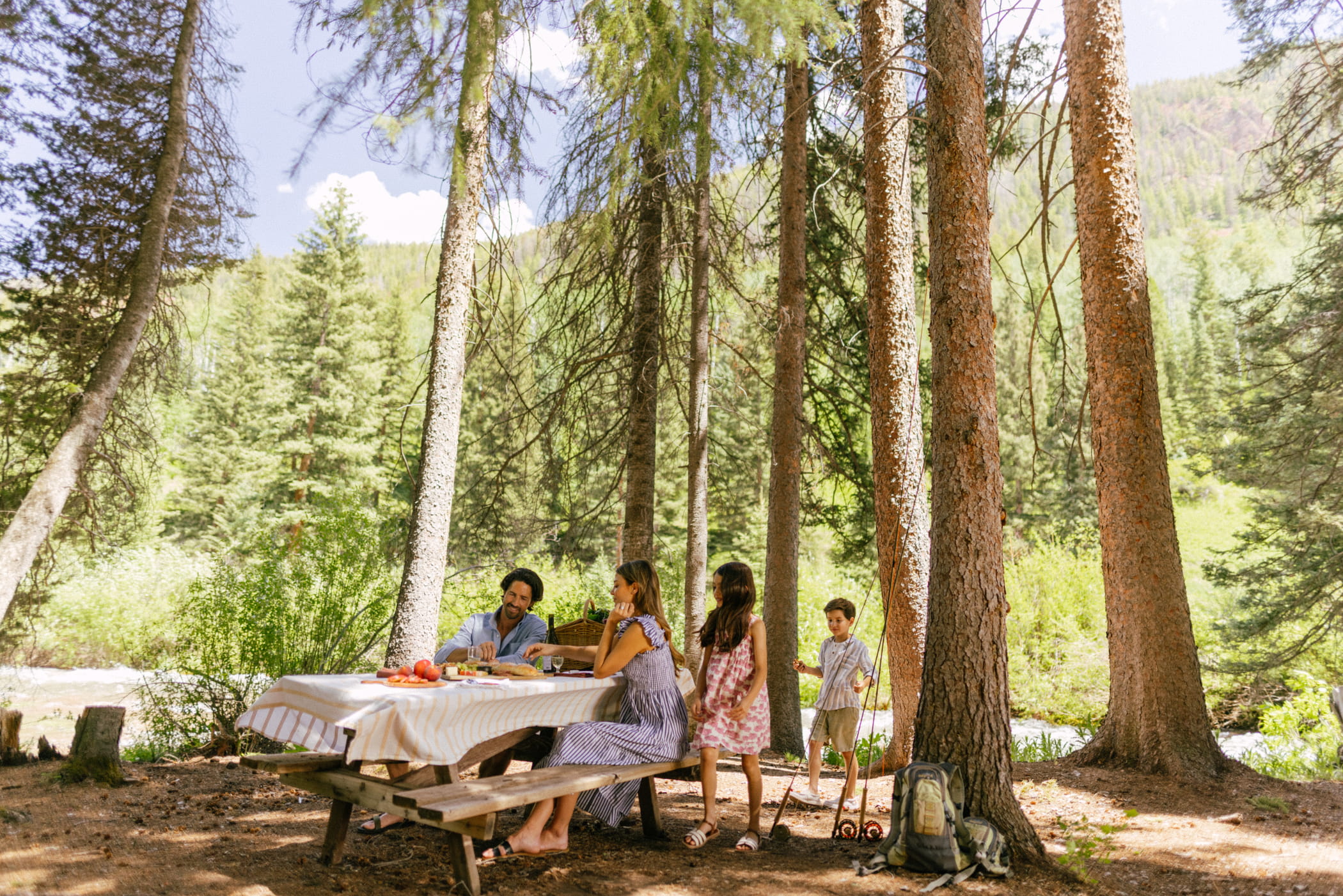 Family having a picnic in the woods